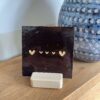 Espresso bruin - Tegeltje met een groot hartje drie kleine hartjes en een groot hartje Tegeltje met een groot hartje drie kleine hartjes en een groot hartje