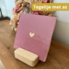 Tegeltje met een groot hartje met as er in